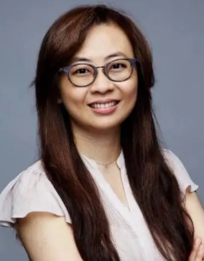 Dr. Chen, dentist at Silver Spring dental practice, smiling portrait.