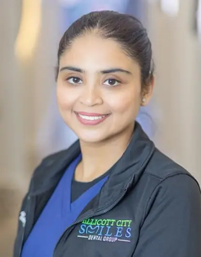 Dr. Khatra, dentist at Prescott City Smiles Dental Group in Silver Spring, MD.